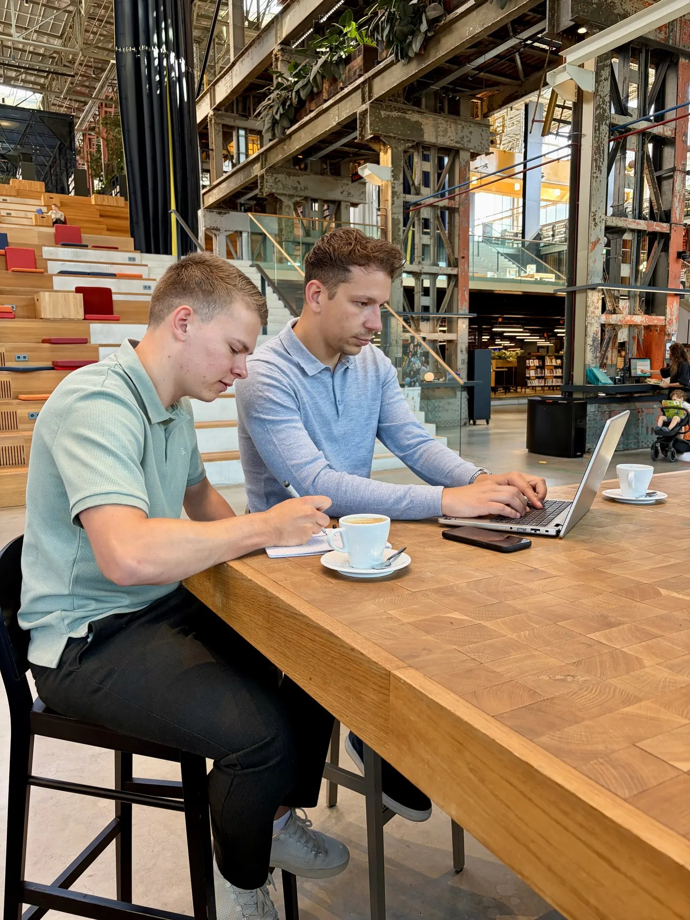 Chris Noordhoek and Dennis van der Heijden working at Datavore